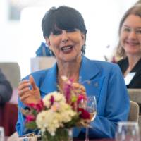 faculty clapping and smiling